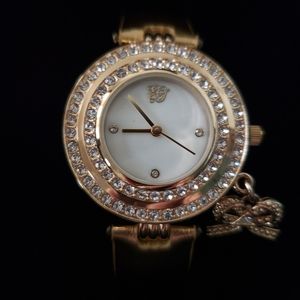 Elizabeth Taylor White Diamonds Gold Tone Crystal Watch.